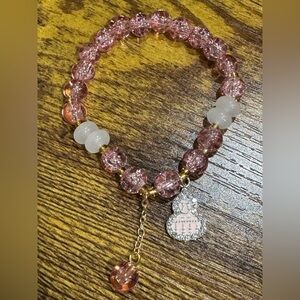 Elegant Pink Beaded Bracelet with Charm